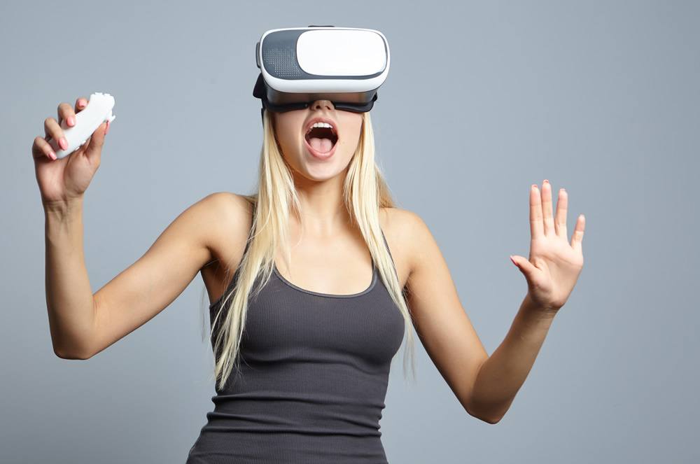 Young woman using VR fun